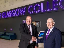 Graeme Dey shaking hands with Principal Paul Little CBE at City of Glasgow College 