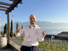 Tom with his certificate 