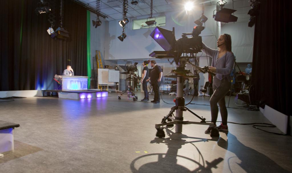 Students in TV studio at City of Glasgow College City campus_photo taken pre-Covid