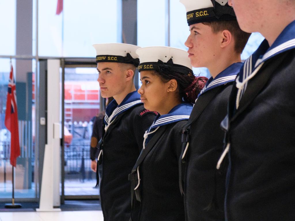 Cadets in uniform on riverside campus