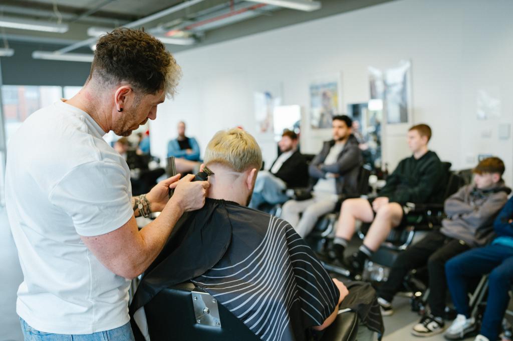 Professional barber Emi Balogh demonstrated on Sasha Dunko