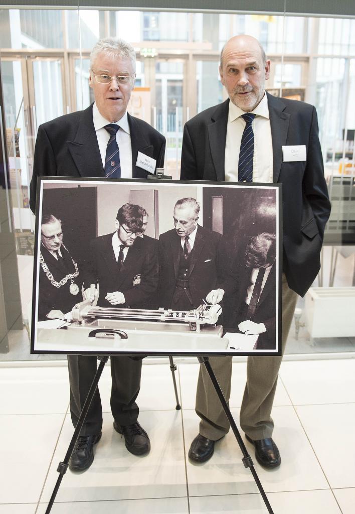 Two members of The Class of 69 in the atrium at Riverside.