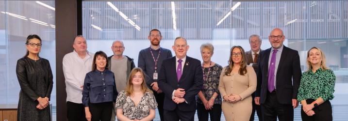 Members of the Boards of Management standing in a line.